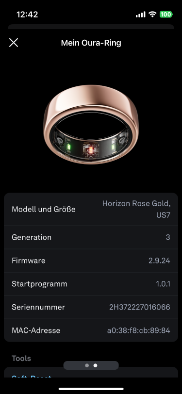 an app screen showing a picture of a gold ring, with the ring model, size, generation, and firmware version